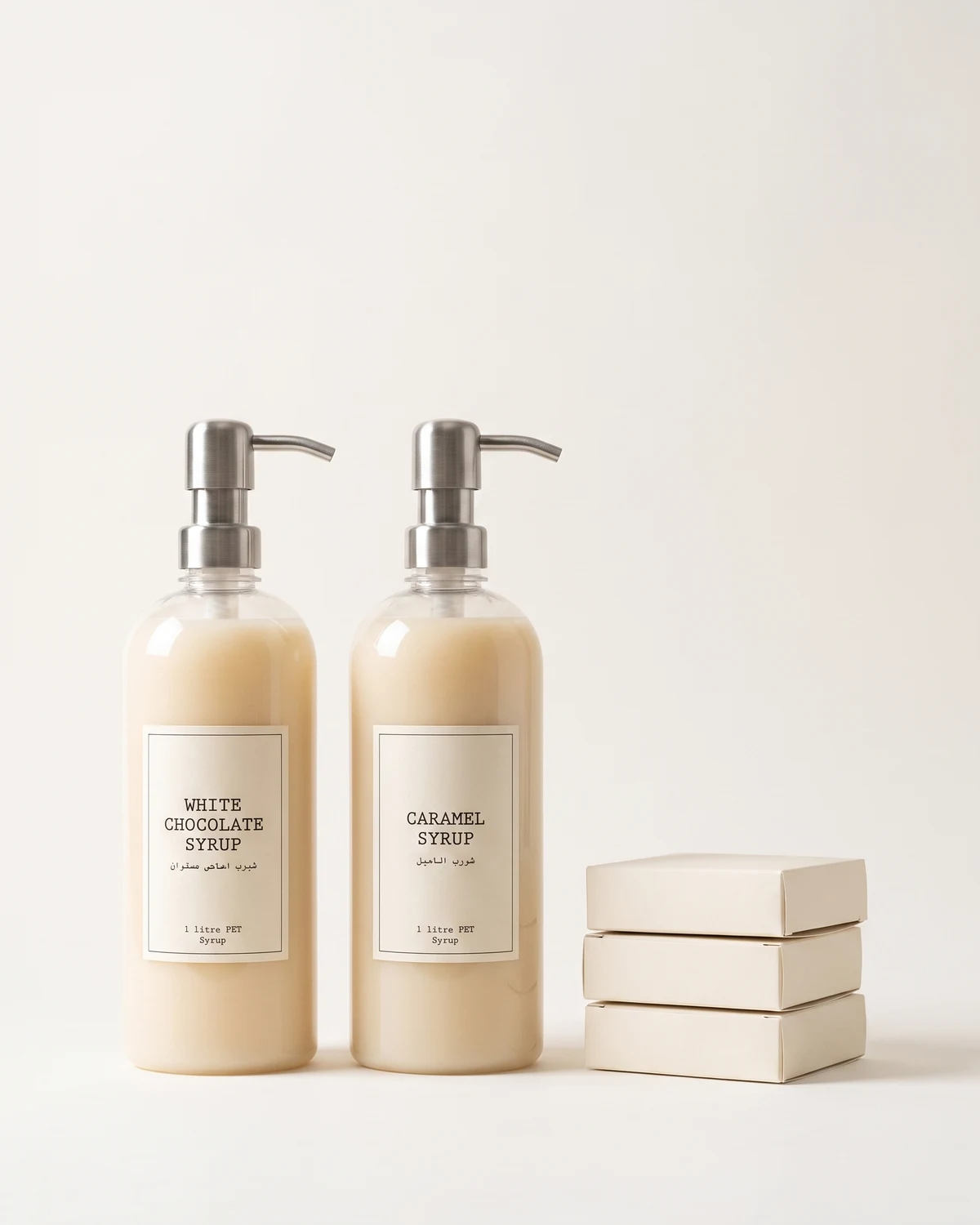 Brix bottles fitted with bar pumps beside plain cream cases