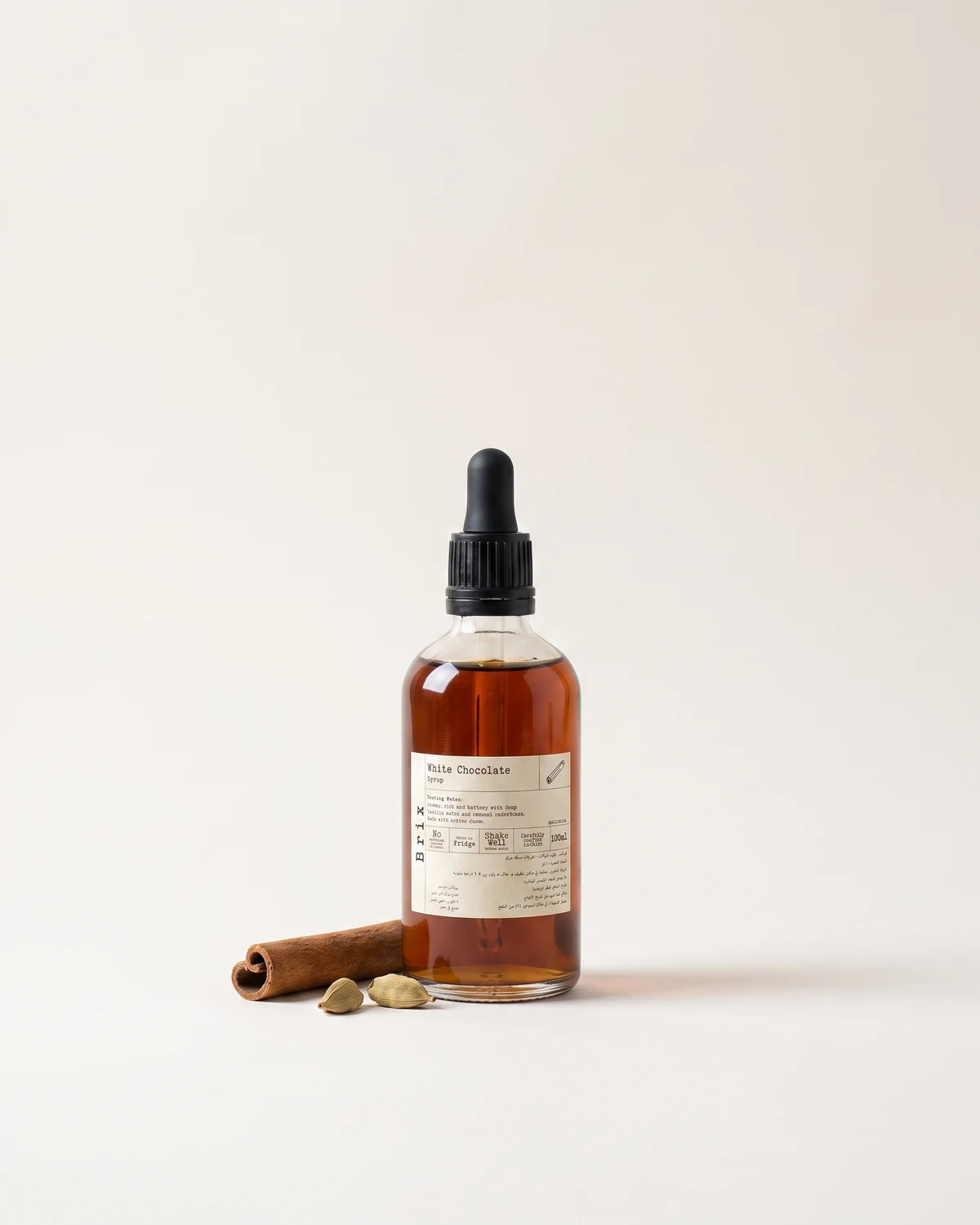 Three small glass Brix tincture bottles with black dropper caps